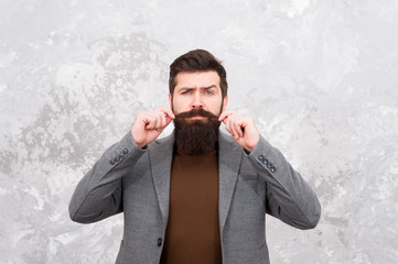 Barbershop service. Elegance stays in fashion. Fashion model touch his moustache. Man wearing...
