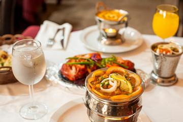 Indu food dishes on restaurant table