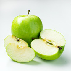 green apple with a slice of cut