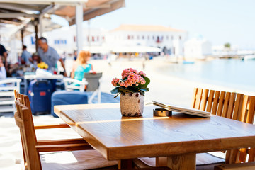 Seaside restaurant in Greece - obrazy, fototapety, plakaty