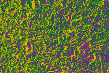 abstract texture of a background of bright colored crumpled foil