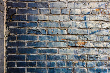 Magical blue white and grey faded painted bricks with tan mortar between background