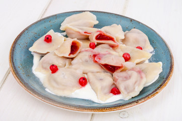 Dumplings with pastry stuffed with fresh berries.