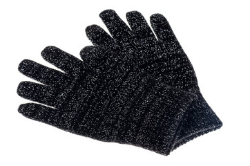 Black knitted baby gloves isolated on white background