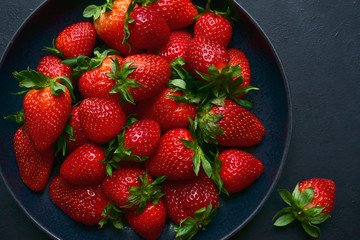 Fresh ripe organic strawberry. Top view with copy space.