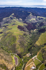 Farms Dot the Deep Valleys in between the Mountains of San Mateo County, California, USA