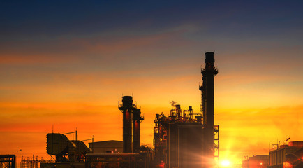 Sunlight Petrochemical industrial plant power station at sunset and Twilight sky view,Amata City Industrial Thailand