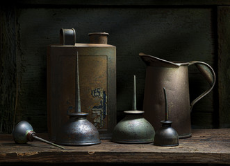 Old oil cans as still life