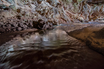 Interior of the Terra ronca cave, the main of the terra ronca caves complex, with underground river, Goias, Brazil