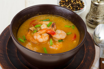 Spicy thai shrimp soup. Studio Photo