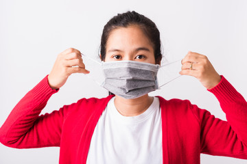 woman wearing face mask protective against coronavirus showing demonstrating correct step