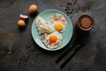 fried eggs in a pan on the table
