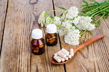 Traditional medicine concept, medicinal plants and herbal capsules