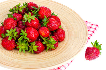 Ripe sweet farmer red strawberries on wooden dish
