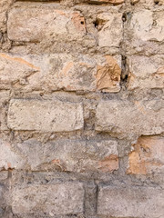 Fragment of an old brick wall. Background, brick texture