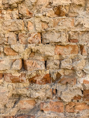 Fragment of an old brick wall. Background, brick texture