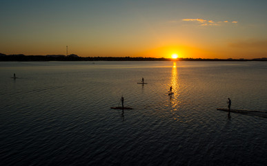 Stand up paddle on Rio Tocantins, during sunset, Chapada das mesas, Brazil