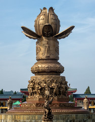 Bronze lotus flower monument in Nanshan tourist attraction, China