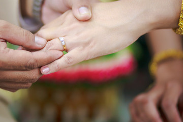 The ring on bride's finger in wedding ceremony wedding thailand