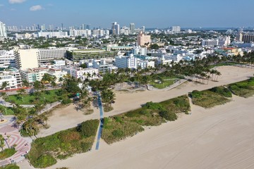Fototapeta na wymiar Aerial view of South Beach in Miami Beach, Florida devoid of people under coronavirus pandemic beach and park closure.