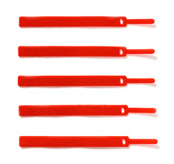 red velcro cable ties on white background