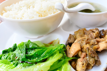 fast food of steamed chicken with vegetable and rice and soup