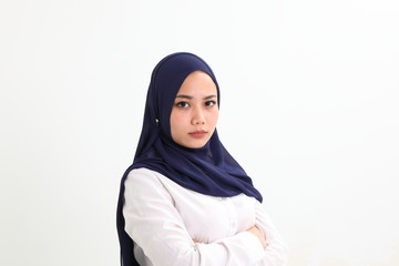 South east Asian Malay Woman headscarf facial expression serous