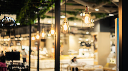 Decorative indoor modern lamp hanging on wall and ceiling.