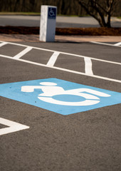 An empty parking lot showing handicap parking spaces © kmlPhoto