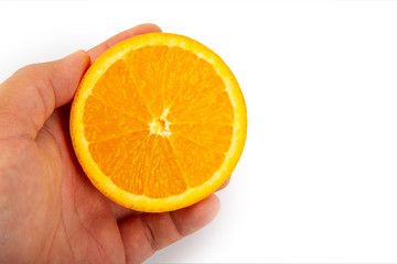 Man hand with orange slice, clipping path, isolated on white background full depth of field