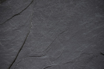 Dark grey black slate background or texture.