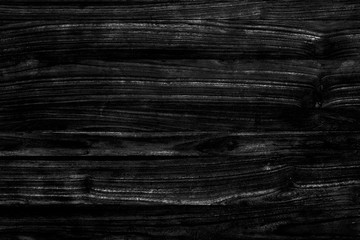 Naklejka premium Rustic black wood textured background