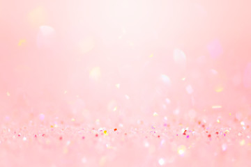 Soft pink glitter confetti bokeh background