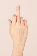 Middle finger of a feminine hand