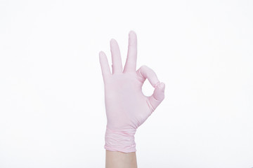 A large hand in a rubber glove close-up shows that everything will be fine. protective agent during an epidemic. Ads for antiseptics and medical equipment on a white background.