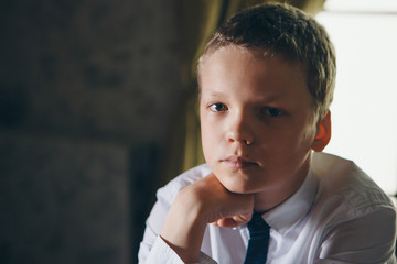 isolated photo: portrait of a serious young guy. the concept of healthy eyes, vision