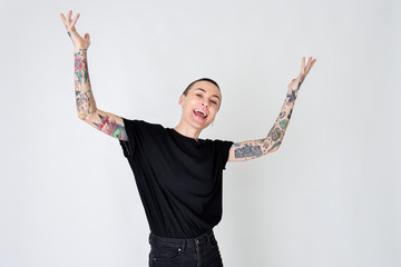 Cool playful tattooed woman