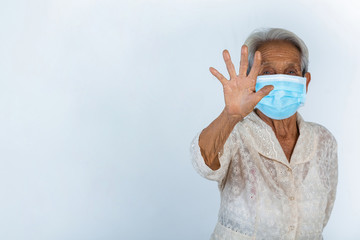 Grandmother is  making hight five, opening hand on white background-  concept mask campaign