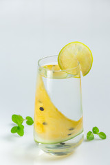 Yellow watermelon juice in white background