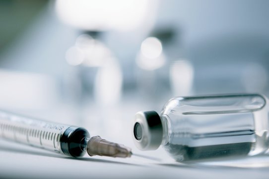 Medicine In Vials And Syringe , Ready For Vaccine Injection , Cancer Treatment , Pain Treatment And Can Also Be Abused For An Illegal Use, Healthcare And Medical Concept Vaccination.