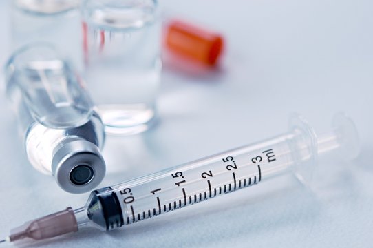 
Medicine in vials and syringe , ready for vaccine injection , Cancer Treatment , Pain Treatment and can also be abused for an illegal use, healthcare and medical concept vaccination.