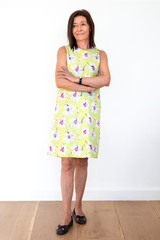 Happy senior woman in a floral dress