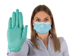 Woman with mask and gloves on isolated