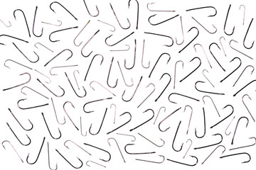 Various fishing hooks background isolated on white