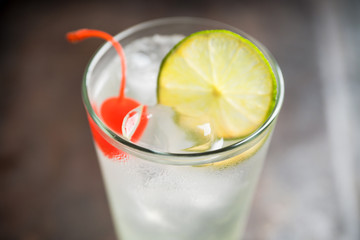 Rum collins cocktail (variation of traditional Tom collins). Selective focus. Shallow depth of field.
