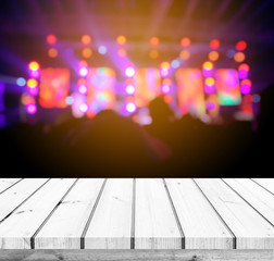 Wood table or wood floor with abstract stage light bokeh background for product display