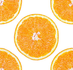 Seamless pattern of isolated slices of orange. Wallpaper for background, design and packaging.