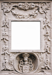 Decorative ornament of light stone in the form of plant elements. Medieval, baroque element of architecture. Bas-relief, copy space, mockup.