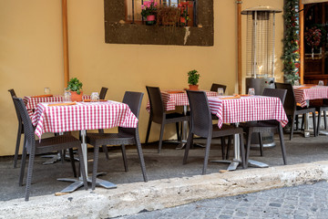 Fototapeta na wymiar Empty pizzeria in Rome, terrace of italian restaurant