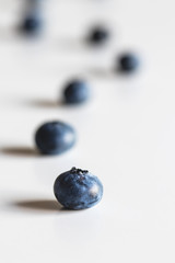 Group of fresh blueberries isolated on white background. Healthy food, health